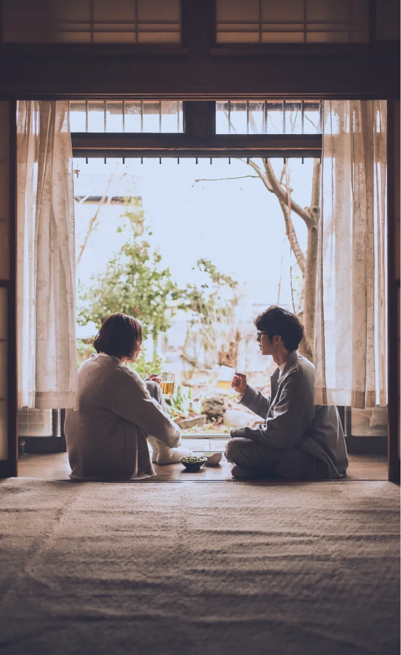 Sharing drinks beside the window