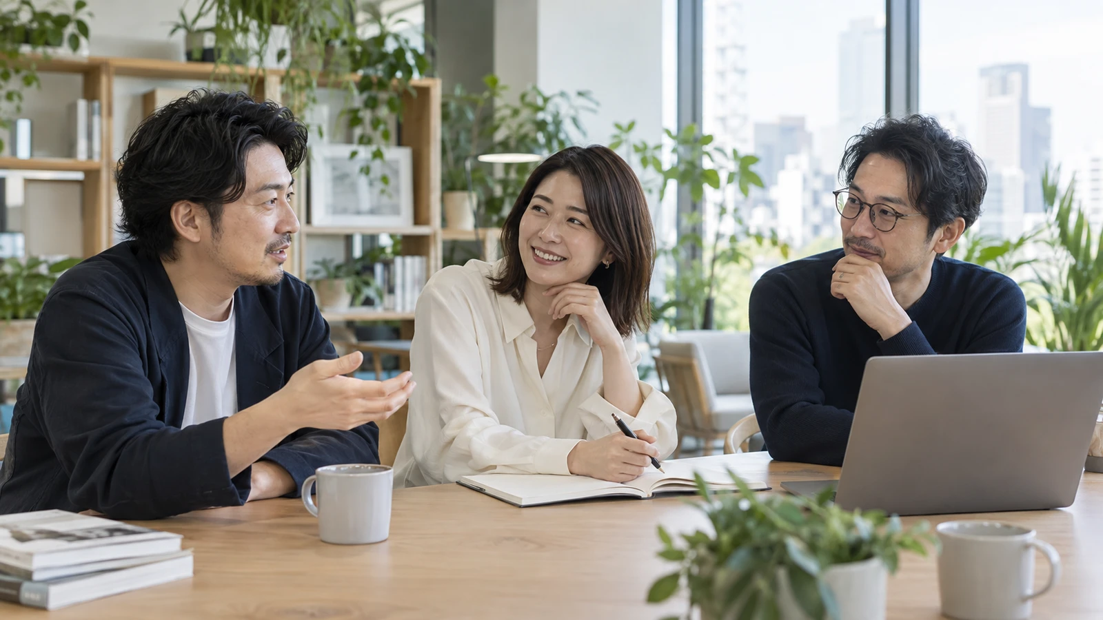 Three fictional consultants in a bright studio with indoor plants
